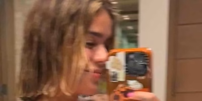 Karol G cuts her hair in an intimate gesture of reinvention