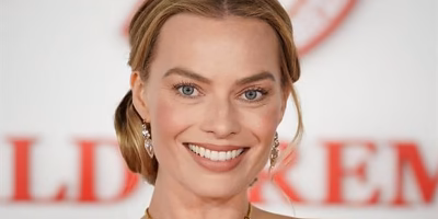 O colar de Taylor que roubou a câmera na estreia de Margot Robbie