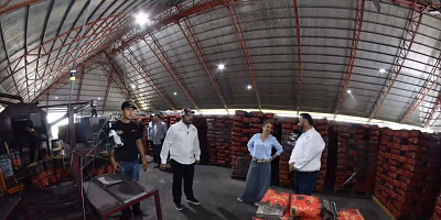 Olga Sosa supervises charcoal project in Tamaulipas